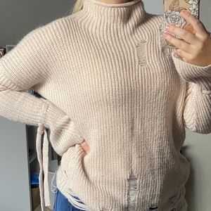 Blush pink ripped sweater - size small